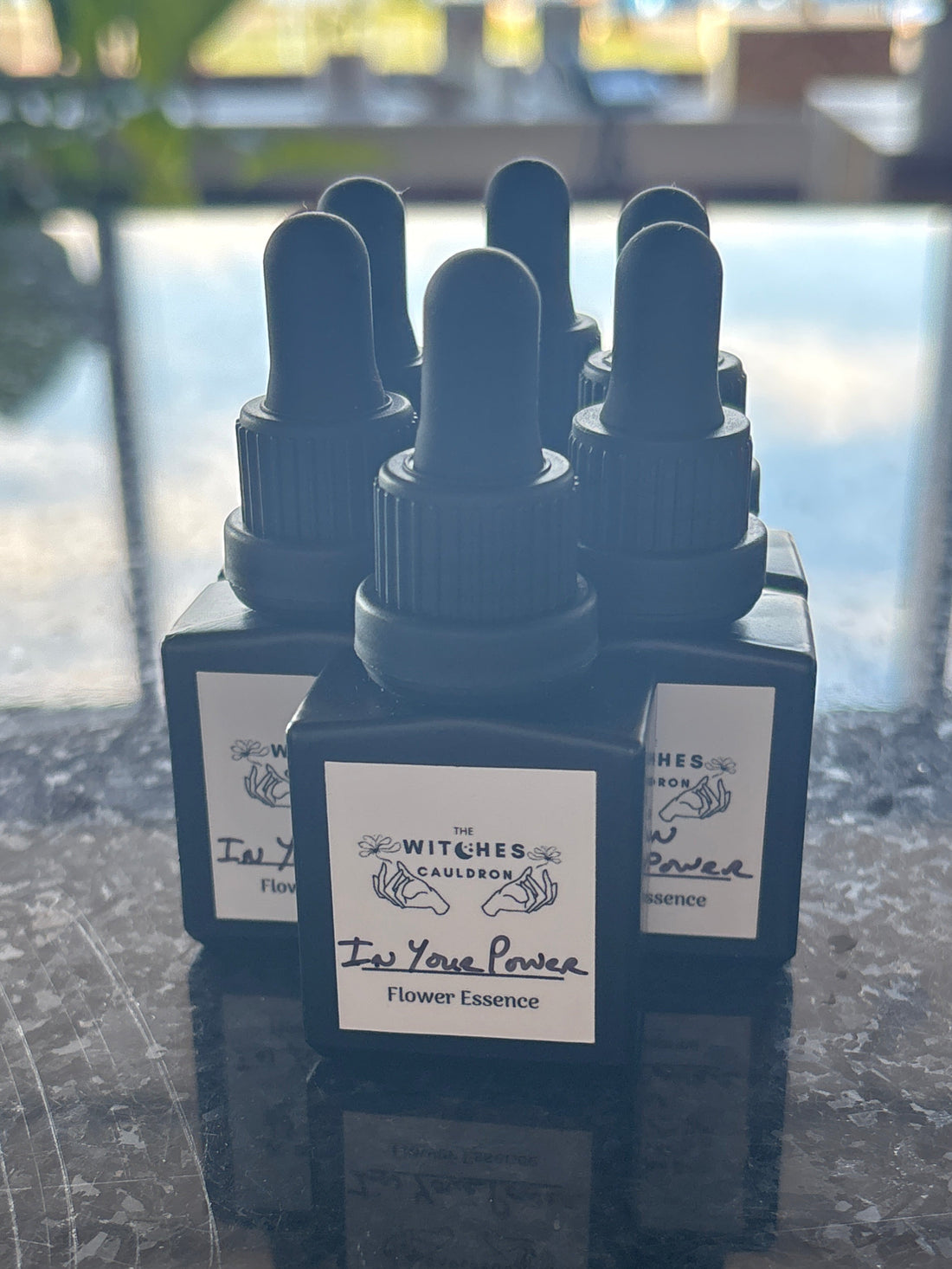Small black bottles with white labels